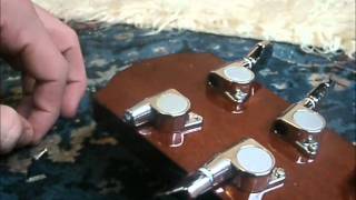 How to replace a guitar machine head  tuning key [upl. by Nasas]